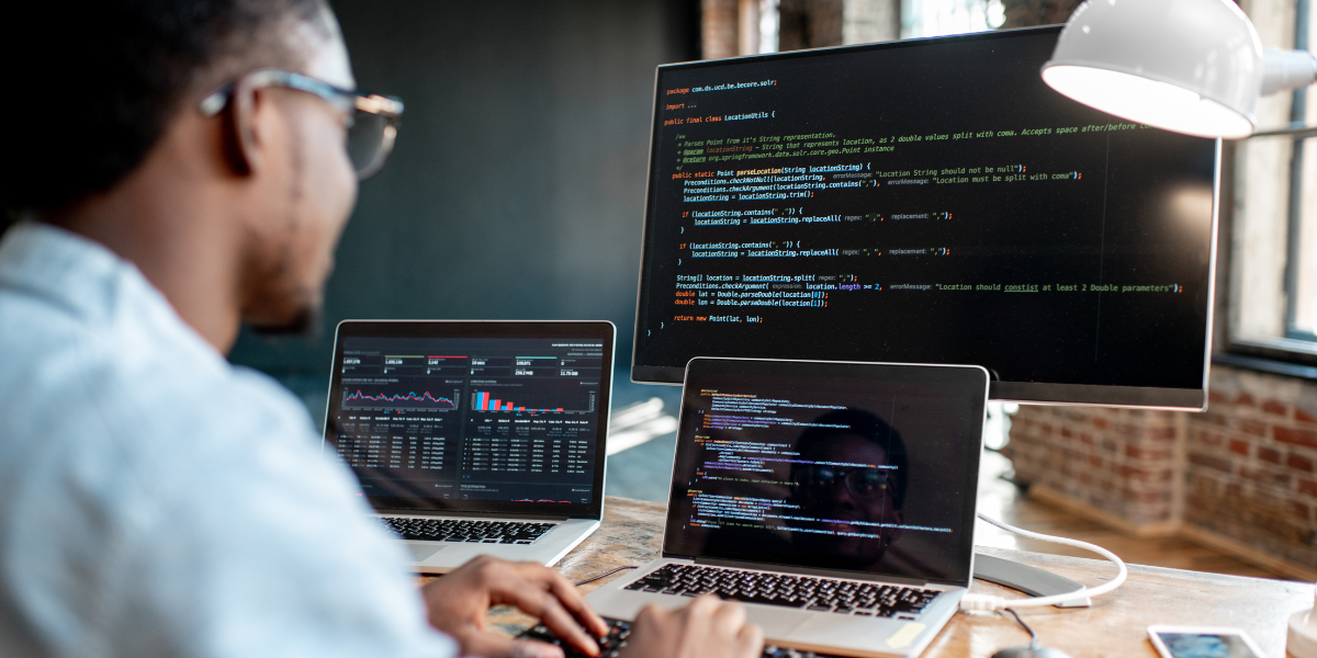 A programmer crafting innovative solutions, demonstrating the creative potential and job security of pursuing a career in technology.