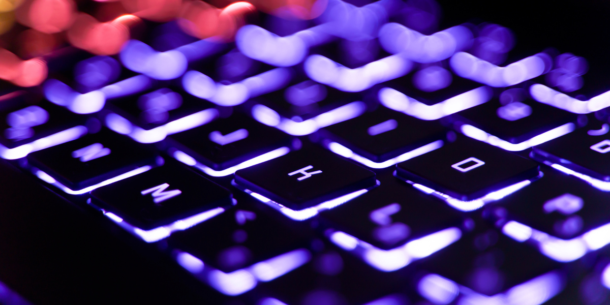 A high-quality close-up of an ergonomic keyboard designed for maximum comfort and efficiency, helping to create a more productive workspace.