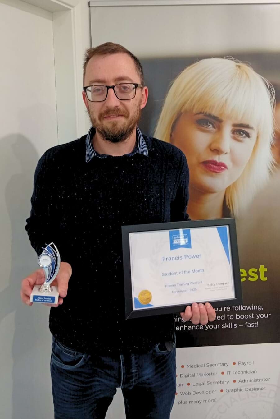 Francis Power, Pitman Training Wexford Student of the Month, holding his award and certificate after completing the Management Diploma.