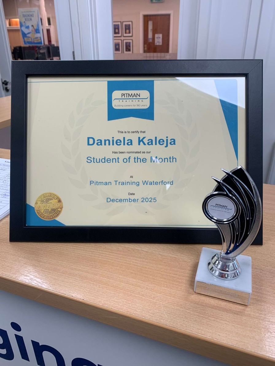 Daniela Kaleja receiving Student of the Month award at Pitman Training Waterford