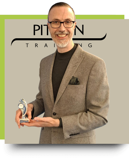 Dominic McGinley holding his award